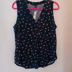NWT Ann Taylor short sleeve black top with yellow, green, white & blue Floral.